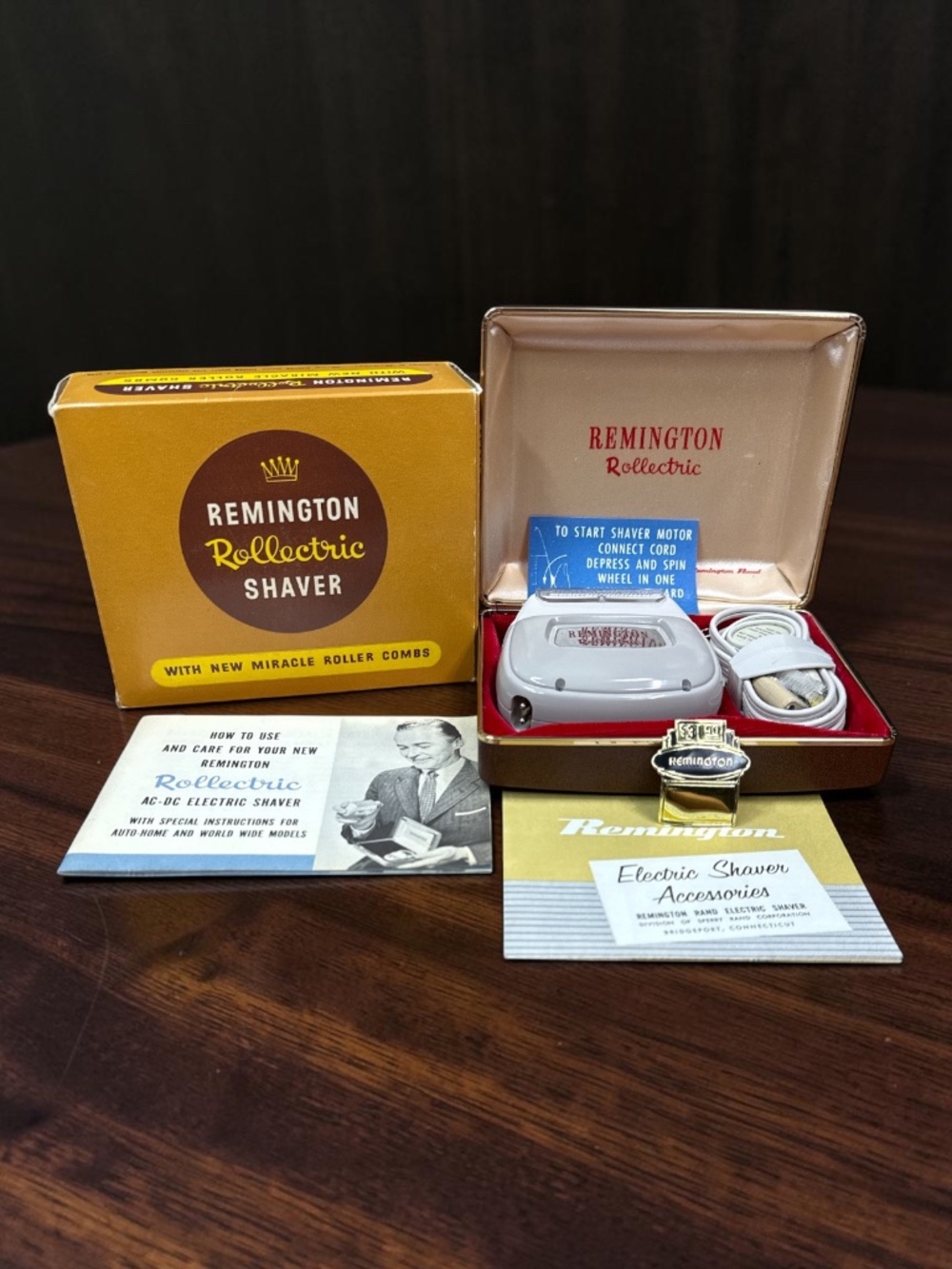 1950’s REMINGTON Rollectric Shaver with New Miracle Roller Combs